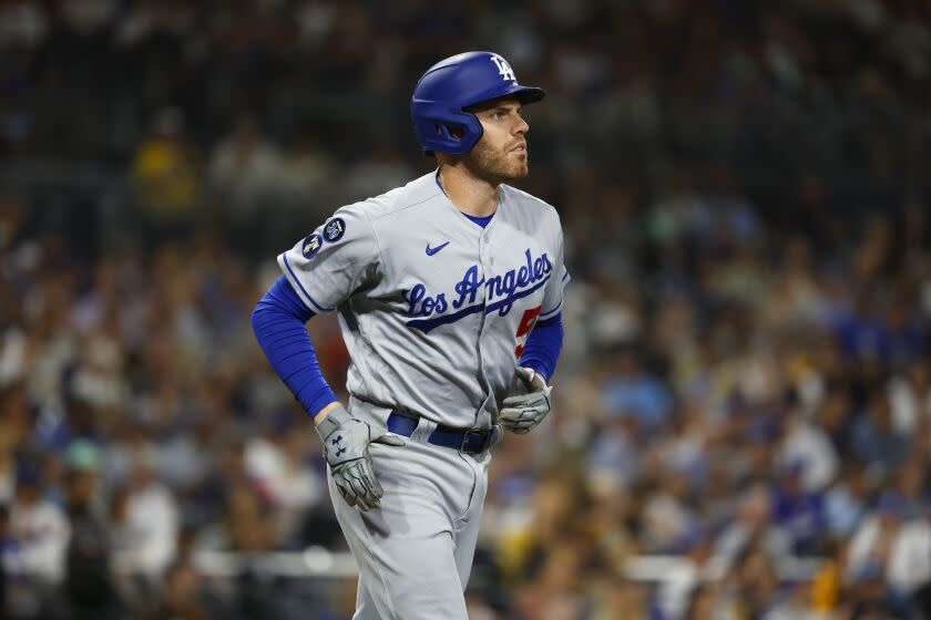 Dodgers' Freddie Freeman walks in the fourth inning against the San Diego Padres