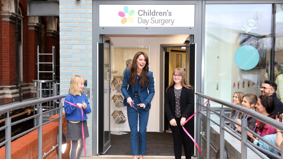 Kate Middleton cutting ribbon at Evelina London