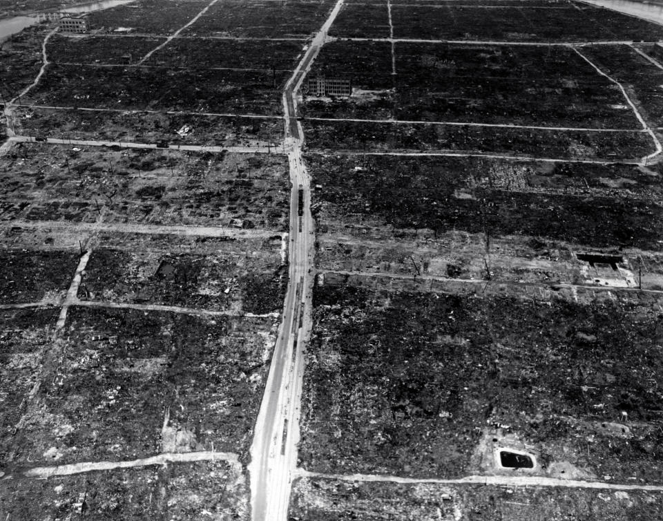 FILE - In this Sept. 5, 1945, file aerial photo, the landscape of Hiroshima, western Japan, shows widespread rubble and debris, one month after the atomic bomb was dropped. An estimated 140,000 people, including those with radiation-related injuries and illnesses, died through Dec. 31, 1945. That was 40% of Hiroshima’s population of 350,000 before the attack. (AP Photo/Max Desfor, File)
