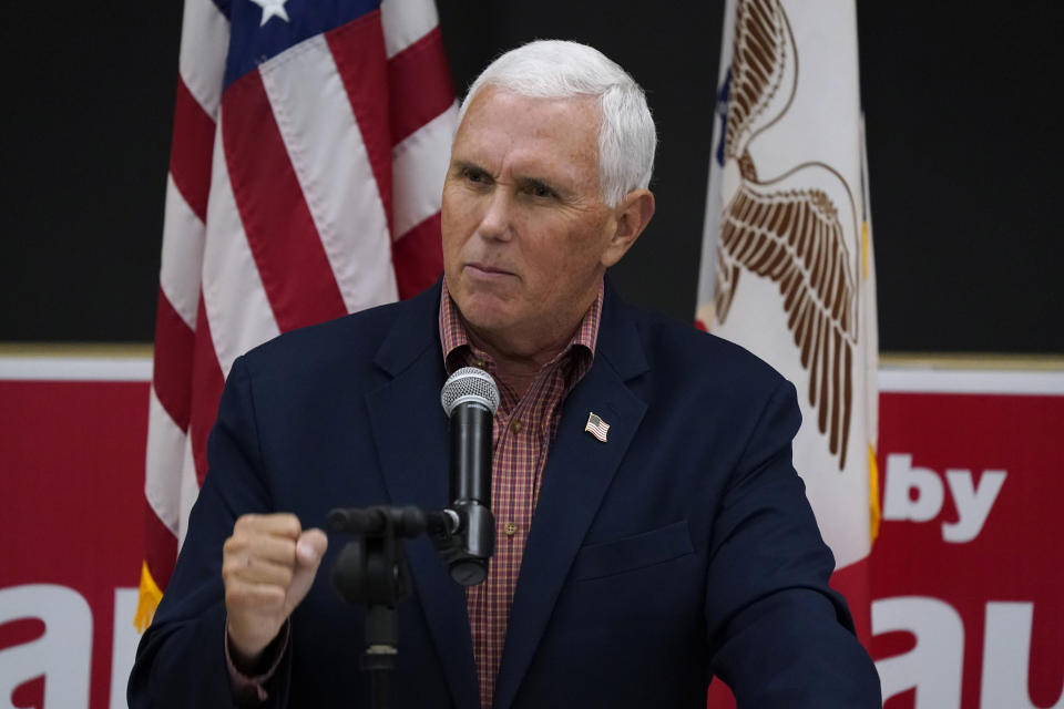 Former Vice President Mike Pence speaks at the Kaufmann Family Harvest Dinner, Thursday, Sept. 29, 2022, in Wilton, Iowa. (AP Photo/Charlie Neibergall)