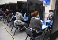 Students take coronavirus disease (COVID-19) tests at Harris Academy Beckenham, in London