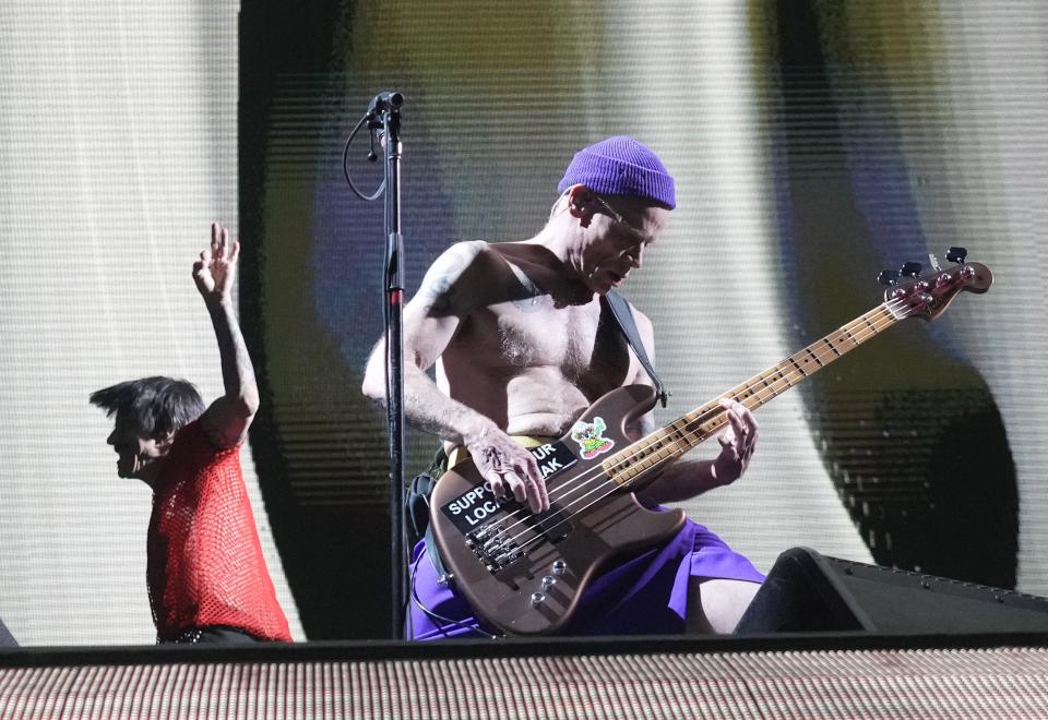 Vocalist Anthony Kiedis and bassist Flea perform with the Red Hot Chili Peppers in May in Glendale, Arizona.