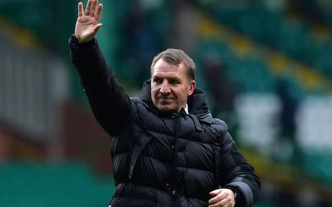Brendan Rodgers greets the Celtic fans - Credit: Mark Runnacles/Getty Images