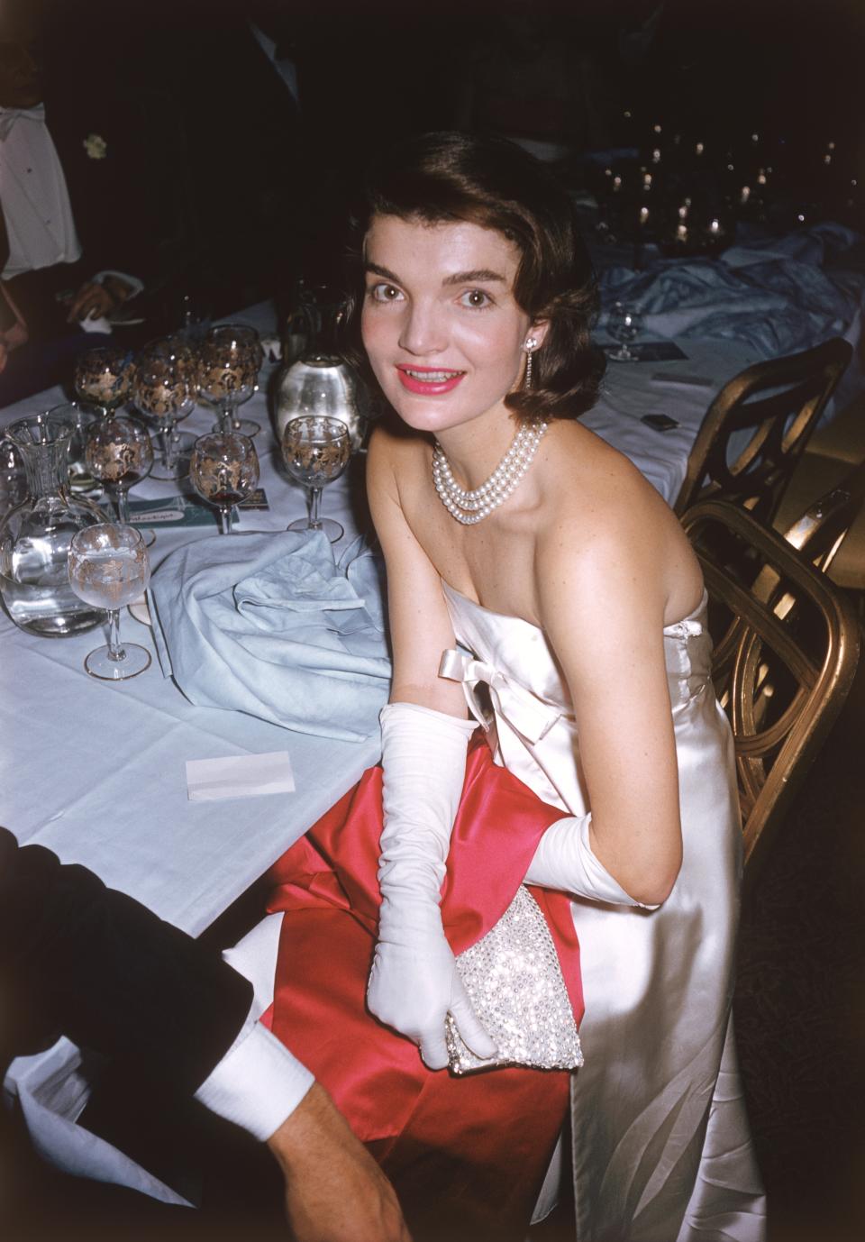 Premium Rates Apply. Jacqueline Kennedy (Jackie Onassis) (1929 - 1994) wife of Senator Jack Kennedy at an 'April in Paris' ball, 1958. Original Artwork: A Wonderful Time - Slim Aarons   (Photo by Slim Aarons/Getty Images)