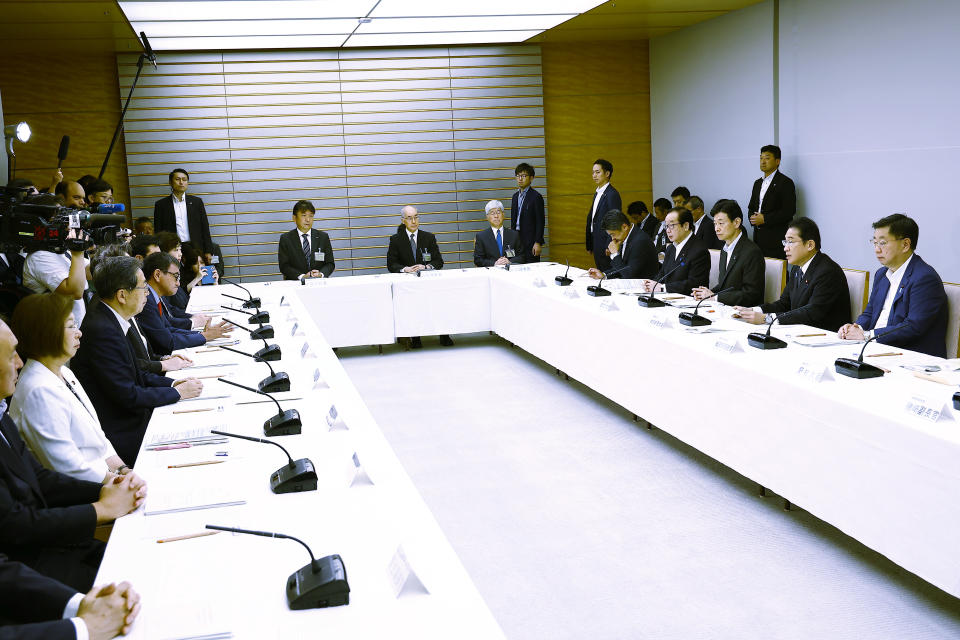 Japanese Prime Minister Fumio Kishida, second right, speaks during a meeting with representatives of the Inter-Ministerial Council for Contaminated Water, Treated Water and Decommissioning Issues and the Inter-Ministerial Council Concerning the Continuous Implementation of the Basic Policy on Handling of Advanced Liquid Processing System (ALPS) Treated Water, at the prime minister's office in Tokyo Tuesday, Aug. 22, 2023. (Rodrigo Reyes Marin/Pool Photo via AP)