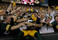 GREEN BAY, WI - SEPTEMBER 08: Greg Jennings #85 of the Green Bay Packers celebrates after scoring a touchdown in the first quarter against the New Orleans Saints during the season opening game at Lambeau Field on September 8, 2011 in Green Bay, Wisconsin. (Photo by Jonathan Daniel/Getty Images)