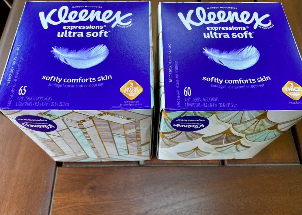 Two boxes of Kleenex tissues are displayed in Ann Arbor, Mich., on Wednesday, May 25, 2022. The package holds five fewer tissues, but the price remains the same. (AP Photo/Dee-Ann Durbin)