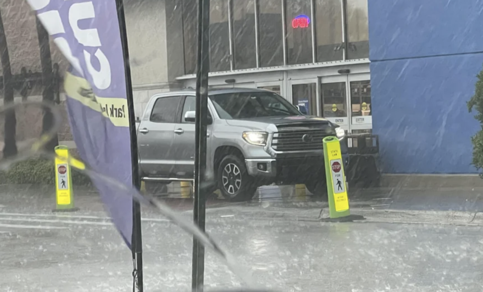 A truck blocking a store entrance