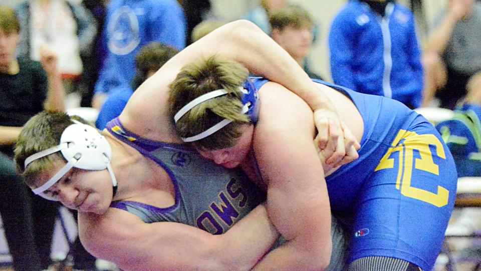 Watertown 285-pounder Micah Hach wraps up Aberdeen Central's Jacob Krenz during an Eastern South Dakota Conference wrestling triangular on Thursday, Jan. 26, 2023 in the Watertown Civic Arena.