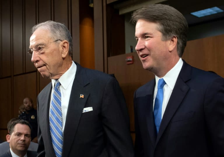 Supreme Court nominee Brett Kavanaugh, alongside Senator Chuck Grassley, attends a confirmation hearing in the US Senate on Capitol Hill