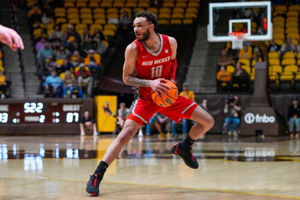 New Mexico Lobos guard Jaelen House (10) looks to pass against the Wyoming Cowboys during the second half at Arena-Auditorium.