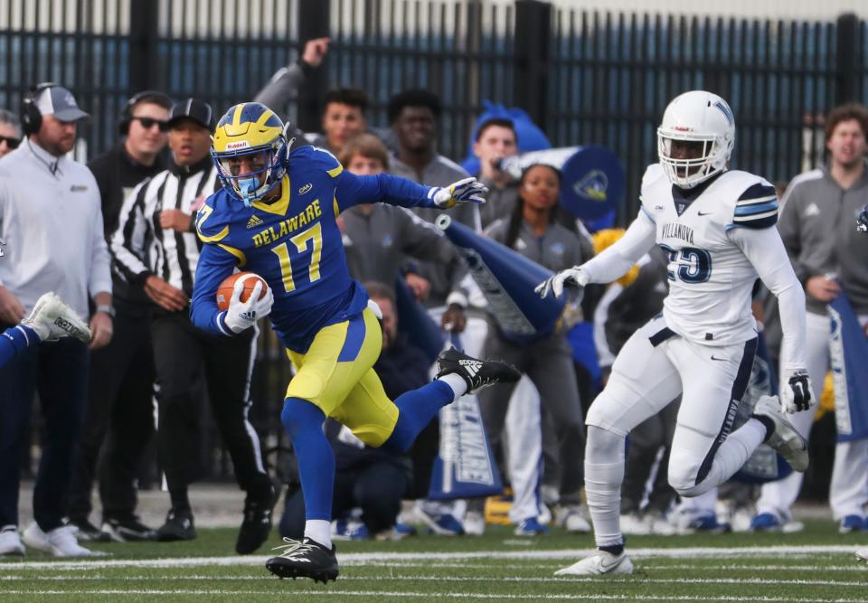 Delaware's Jourdan Townsend returns a punt 34 yards to near midfield against Villanova in the second quarter at Delaware Stadium, Saturday, Nov. 20, 2021.