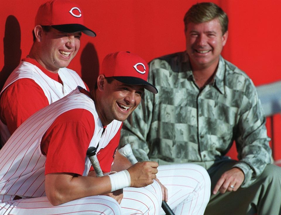 Aaron Boone (foreground) and Sean Casey share a laugh with Jim Bowden. March 26, 2000.