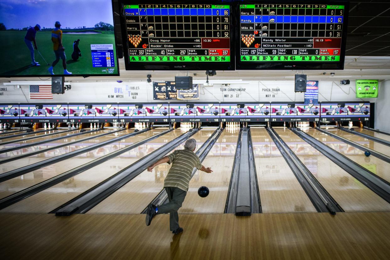 Doug Hepner, 94, tosses the ball during league play at B&B Bowling Lanes in Fayetteville on Tuesday, May 1, 2024.