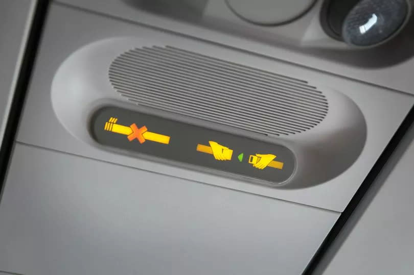 Emergency sign in airplane.