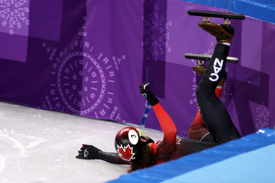 <p>Samuel Girard of Canada crashes during the Men’s 1500m Short Track Speed Skating semifinals on day one of the PyeongChang 2018 Winter Olympic Games at Gangneung Ice Arena on February 10, 2018 in Gangneung, South Korea. (Photo by Jamie Squire/Getty Images) </p>