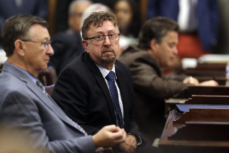 Rep. David Byrd, R-Waynesboro, center, attends a special session of the House of Representatives Friday, Aug. 23, 2019, in Nashville, Tenn. The expulsion of Byrd, who's accused of sexual misconduct by three women nearly 30 years ago, was discussed during the session. (AP Photo/Mark Humphrey)