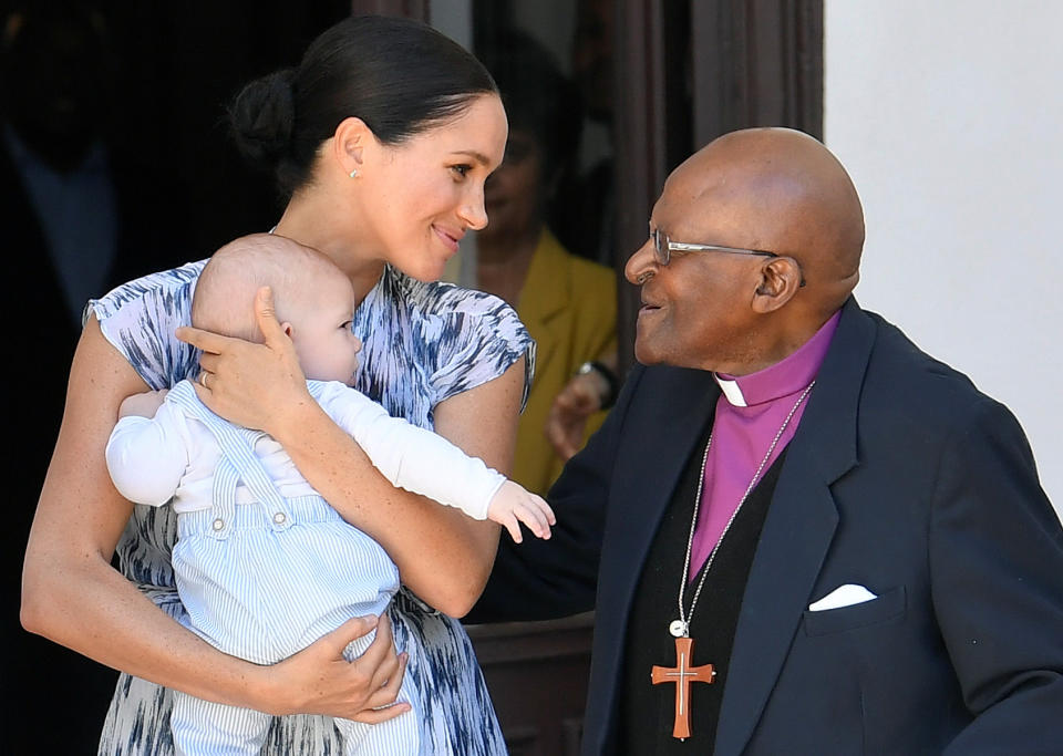 The Duchess of Sussex holding her son Archie meets with Archbishop Desmond Tutu in cape Town, on day three of their tour of Africa.