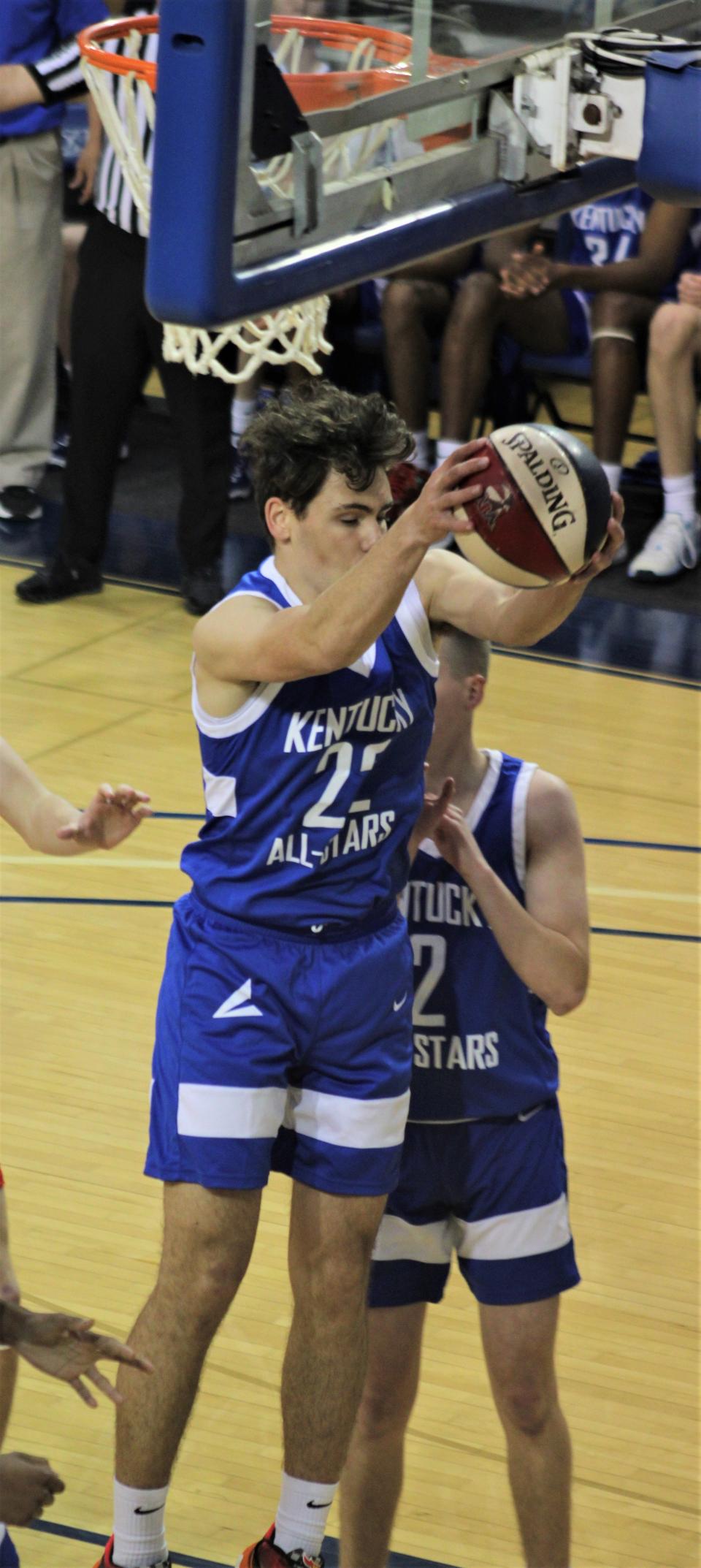 Teagan Moore of Owen County grabs a rebound as Kentucky defeated Ohio 93-83 in the boys edition of the Ohio-Kentucky All-Star Game April 8, 2023, at Thomas More University's Connor Convocation Center.
