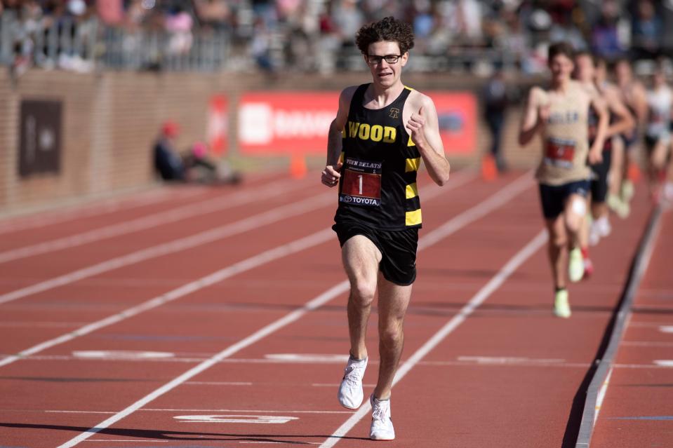 Archbishop Wood senior Gary Martin runs the mile at Penn Relays where he attempted to run one mile under four minute on Friday, April 20, 2022. Martin broke the Penn Relays high school mile record with 4:01.04 by three full seconds after Sean McGorty's 4:04.47 time in 2013. Nur B. Adam / Bucks County Courier Times