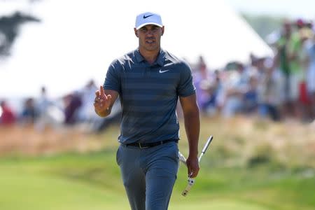 Jun 17, 2018; Southampton, NY, USA; Brooks Koepka reacts on the fifth green during the final round of the U.S. Open golf tournament at Shinnecock Hills GC - Shinnecock Hills Golf C. Dennis Schneidler-USA TODAY Sports