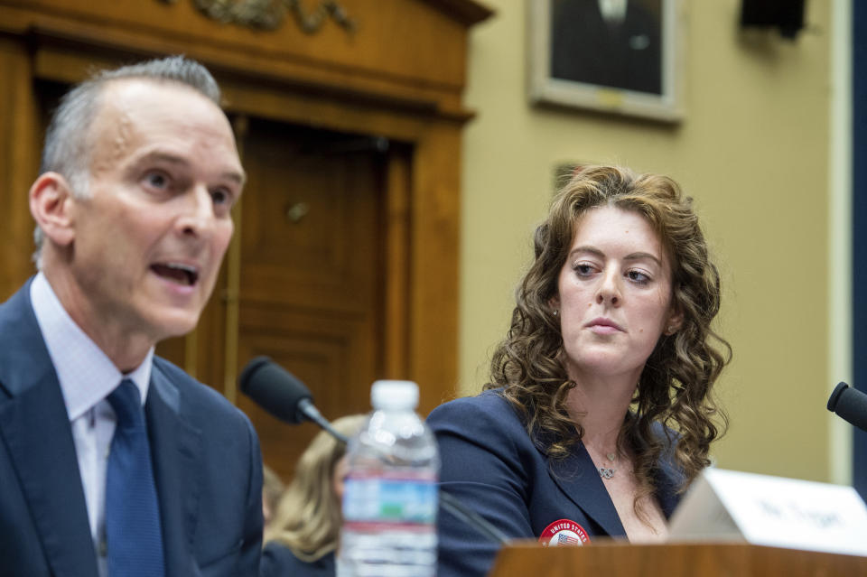 Travis Tygart, Chief Executive Officer of U.S. Anti-Doping Agency, left, testifies as Allison Schmitt, former Olympic athlete, right, listens during a House Committee on Energy and Commerce Subcommittee on Oversight and Investigations hearing examining Anti-Doping Measures in Advance of the 2024 Olympics, on Capitol Hill, Tuesday, June 25, 2024, in Washington. (AP Photo/Rod Lamkey, Jr.)