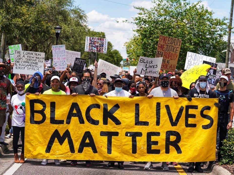 Demonstrators march in Tampa Sunday, May 31, 2020 for a second day in a row as protestors take to the streets of Tampa to protest the Memorial Day death of George Floyd in Minneapolis.  (Martha Asencio-Rhine/Tampa Bay Times via AP)