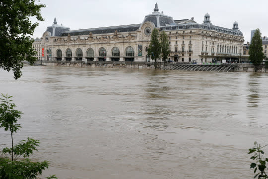 <p>Orsay Museum is closed today as water rises near the area of the Louvre Museum as the Seine river’s embankments overflow after seven days of heavy rain on June 3, 2016 in Paris, France. (Xavier Laine/Getty Images) </p>