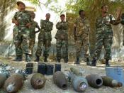 Ethiopian troops display weapons seized from Shebab militants during a 2012 military raid on the insurgent stronghold in the Somali city of Baido