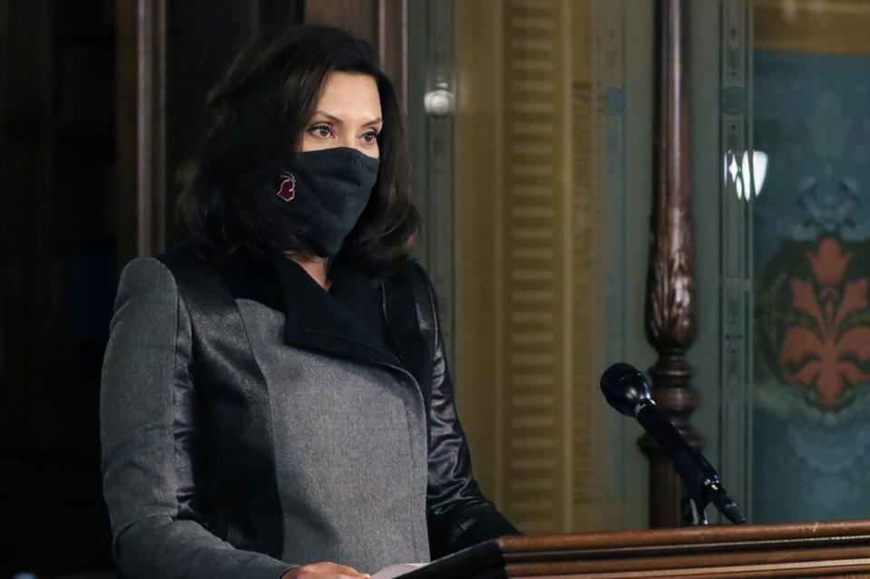 In this photo provided by the Michigan Office of the Governor, Michigan Gov. Gretchen Whitmer addresses the state during a speech in Lansing, Mich., Wednesday, Oct. 21, 2020. The governor is warning that Michigan has more confirmed cases of the coronavirus than ever, noting a sharp increase since the state Supreme Court invalidated her sweeping orders earlier this month. Since the court decision on Oct. 2, the seven-day case average is up to 1,818 — nearly double. (Michigan Office of the Governor via AP)