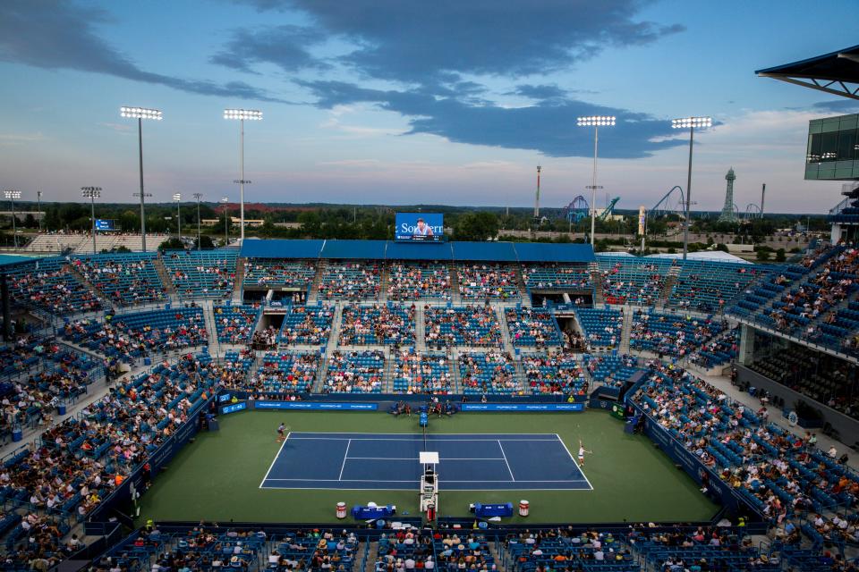 Fans watch a match between Jill Teichmann (SUI) and Naomi Osaka (JPN) in the Western & Southern Open at the Lindner Family Tennis Center in Mason, Ohio on Thursday, Aug. 19, 2021. Teichmann won 3-6, 6-3, 6-3.