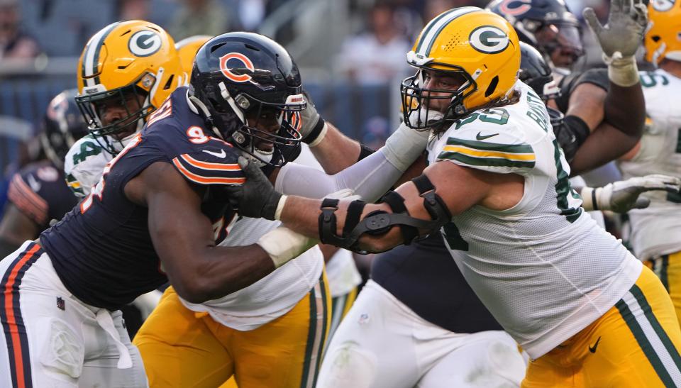 Green Bay Packers offensive tackle <a class="link " href="https://sports.yahoo.com/nfl/players/26732" data-i13n="sec:content-canvas;subsec:anchor_text;elm:context_link" data-ylk="slk:David Bakhtiari;sec:content-canvas;subsec:anchor_text;elm:context_link;itc:0">David Bakhtiari</a> (69) blocks Chicago Bears defensive end <a class="link " href="https://sports.yahoo.com/nfl/players/31049" data-i13n="sec:content-canvas;subsec:anchor_text;elm:context_link" data-ylk="slk:Rasheem Green;sec:content-canvas;subsec:anchor_text;elm:context_link;itc:0">Rasheem Green</a> (94) during the fourth quarter of their regular season opening game Sunday, September 10, 2023 at Soldier Field in Chicago, Ill. The Green Bay Packers beat the Chicago Bears 38-20.