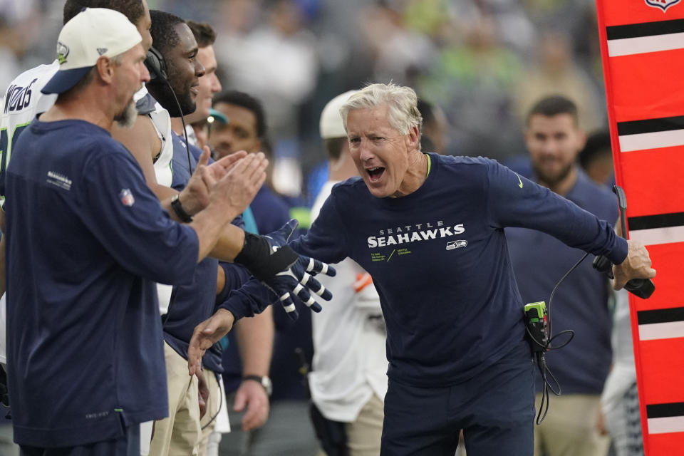 Seattle Seahawks head coach Pete Carroll celebrates at the end of an NFL football game against the Los Angeles Chargers Sunday, Oct. 23, 2022, in Inglewood, Calif. The Seahawks won 37-23. (AP Photo/Mark J. Terrill)