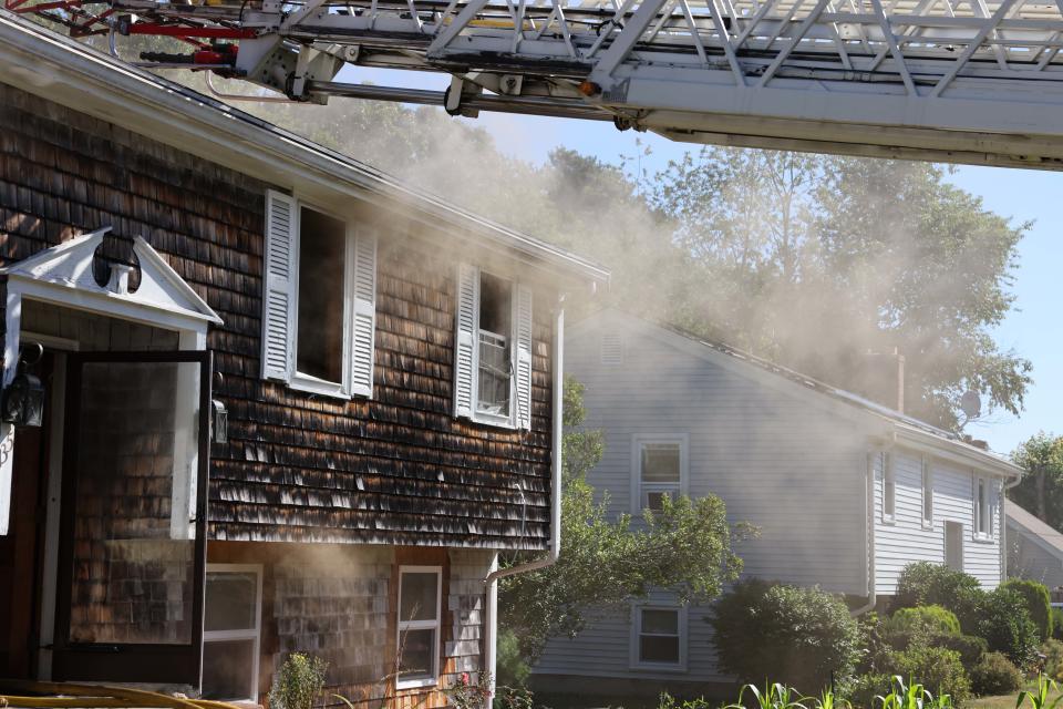 Brockton firefighters battle a house fire at 135 Maplewood Circle on Sunday, Aug. 14, 2022.