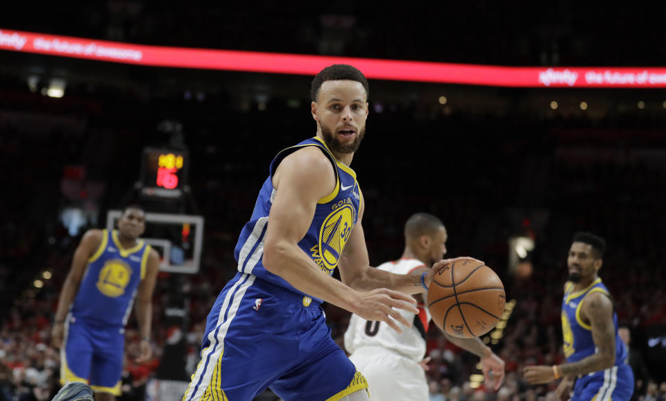 Golden State Warriors guard Stephen Curry (30) dribbles during the first half of Game 4 of the NBA basketball playoffs Western Conference finals against the Portland Trail Blazers, Monday, May 20, 2019, in Portland, Ore. (AP Photo/Ted S. Warren)