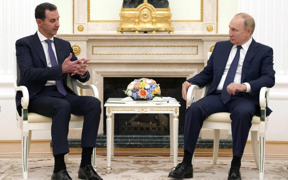 Russian President Vladimir Putin meets with Syrian President Bashar al-Assad at the Kremlin in Moscow on September 13, 2021 - AFP