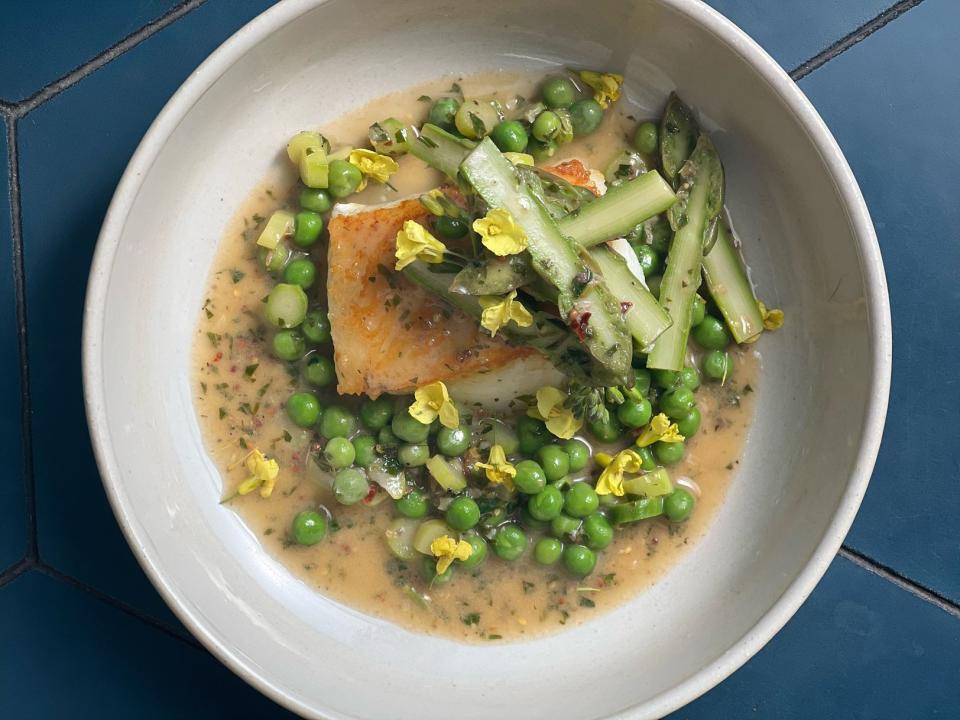 Williamson combines cod with peas and asparagus to make this summertime dish. (Photo: Brooke Williamson)