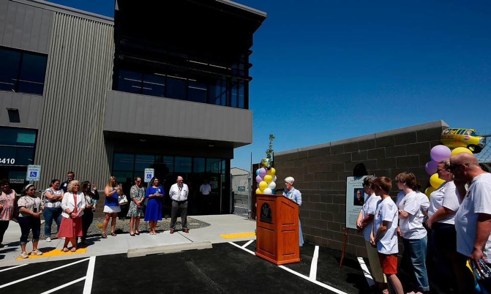 Pasco School superintendent Michelle Whitney speaks during the ribbon cutting ceremony of the new Richard L. Lenhart Transportation Center in Pasco. The new $10 million dollar building is nearly 30,000 square-feet and was constructed to support maintenance and operations of over 200 buses between the Pasco and Finley school district’s transportation departments. It’s named in honor of the slain Pasco school bus driver.