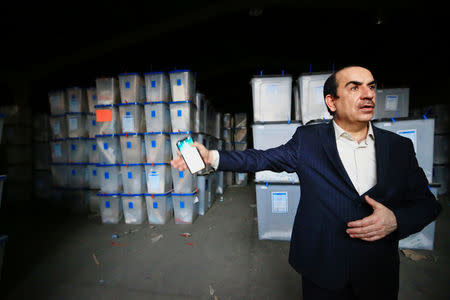Riyadh al-Badran, the head of Iraq's Independent Higher Election Commission, is seen after a fire at a storage site in Baghdad, housing the boxes from Iraq's May parliamentary election, Iraq June 10, 2018. REUTERS/Thaier Al-Sudani