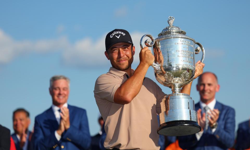 <span>Xander Schauffele celebrates with the trophy after winning the US PGA at Valhalla Golf Club.</span><span>Photograph: Andrew Redington/Getty Images</span>