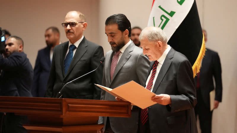 Abdul Latif Rashid takes his oath of office in front of Iraqi lawmakers in Baghdad