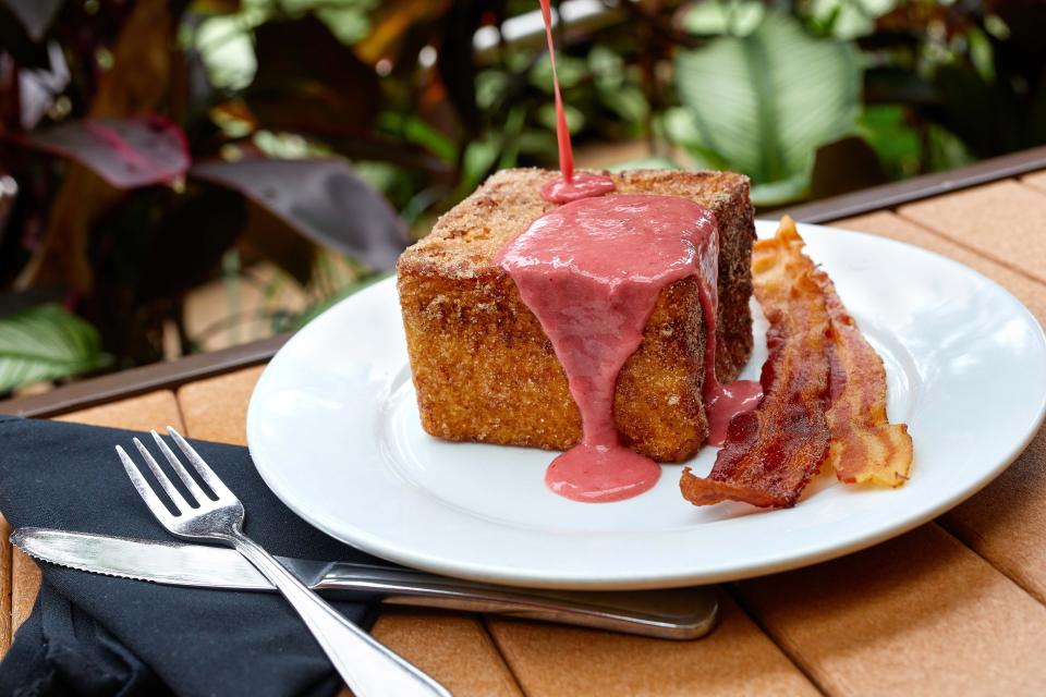 Strawberry compote is poured over thick Tonga Toast at Kona Cafe.