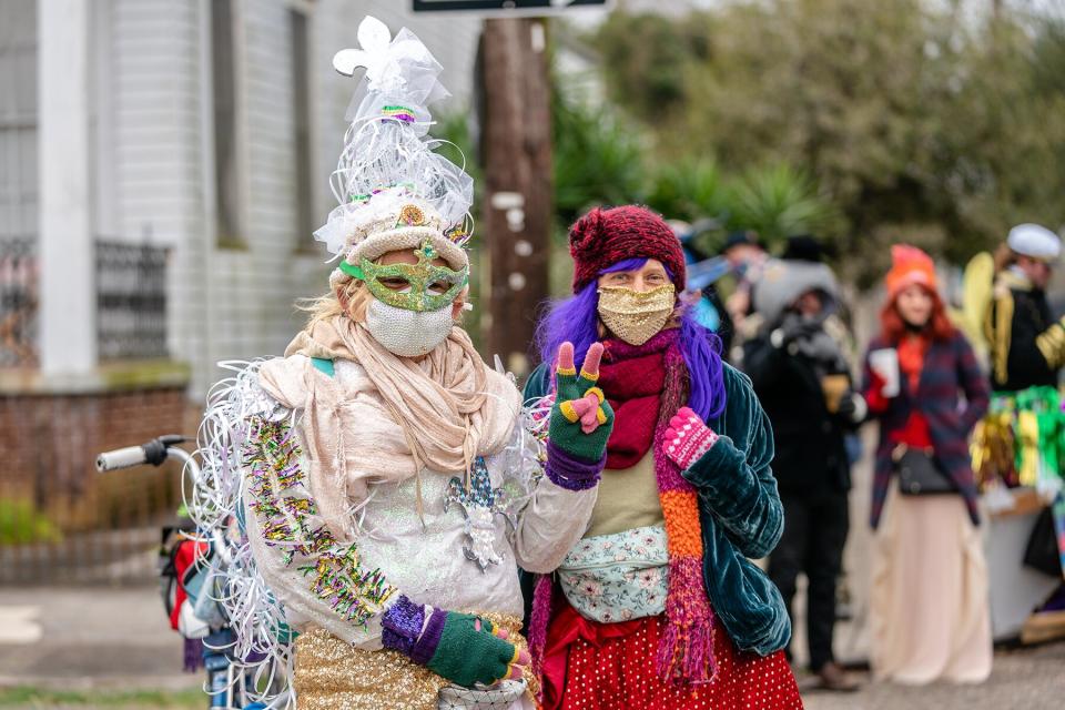 Revelers pose for a photo as they celebrate Mardi Gras on February 16, 2021 in New Orleans, Louisiana