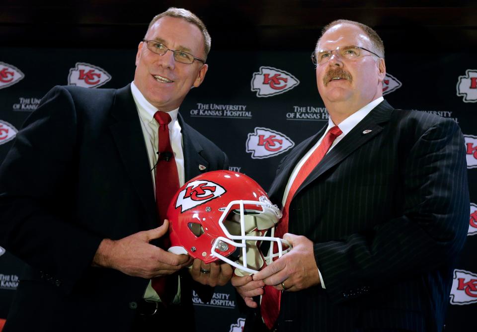 Kansas City Chiefs general manager John Dorsey, left, poses with head coach Andy Reid during a news conference Jan. 14, 2013, in Kansas City.