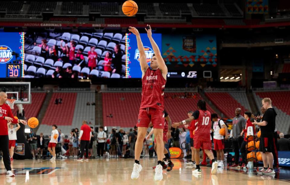 N.C. State’s Michael O’Connell (12) works on his shooting form during the Wolfpack’s open practice on Friday, April 5, 2024, as they prepare for their NCAA National Semi-Final game against Purdue at State Farm Stadium in Glendale, AZ.