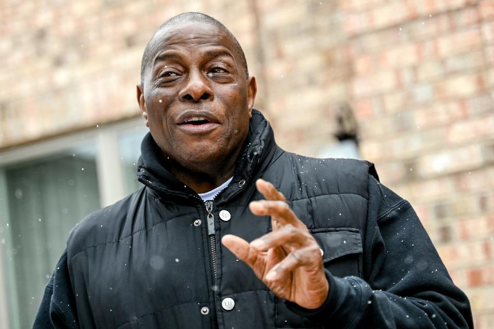 Larry Johnson, Sr., talks about his father, Earvin Johnson, Sr., on Friday, March 10, 2023, outside his parents' home in Lansing.