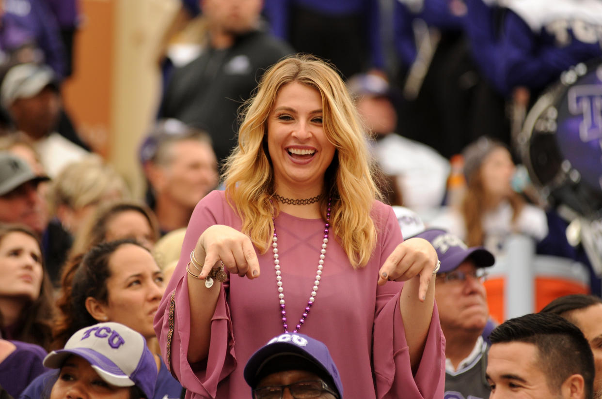 AUSTIN, TX - NOVEMBER 25: A TCU Horned Frogs fan gives the 'horns down' sign during NCAA game featuring the Texas Longhorns and the TCU Horned Frogs on November 25, 2016 at Darrell K. Royal - Texas Memorial Stadium in Austin, TX. The TCU Horned Frogs defeated the Texas Longhorns 31 - 9. (Photo by John Rivera/Icon Sportswire via Getty Images)