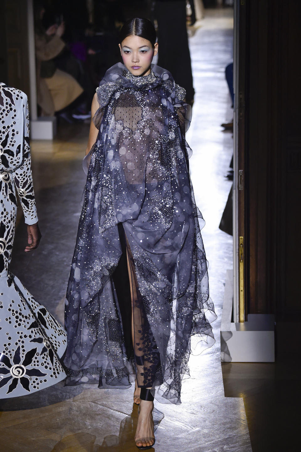 A model walks the runway during the Valentino haute couture spring/summer 2020 show.