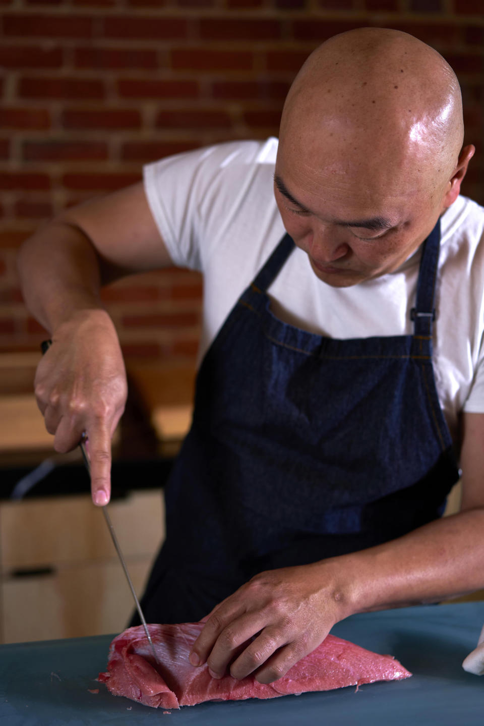 Dallas sushi chef learned how to sign the menu for deaf patrons (Courtesy Tatsu Dallas)