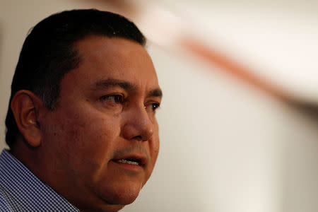 Venezuelan evangelical pastor and presidential pre-candidate Javier Bertucci talks to the media during a news conference in Caracas, Venezuela, February 21, 2018. REUTERS/Marco Bello